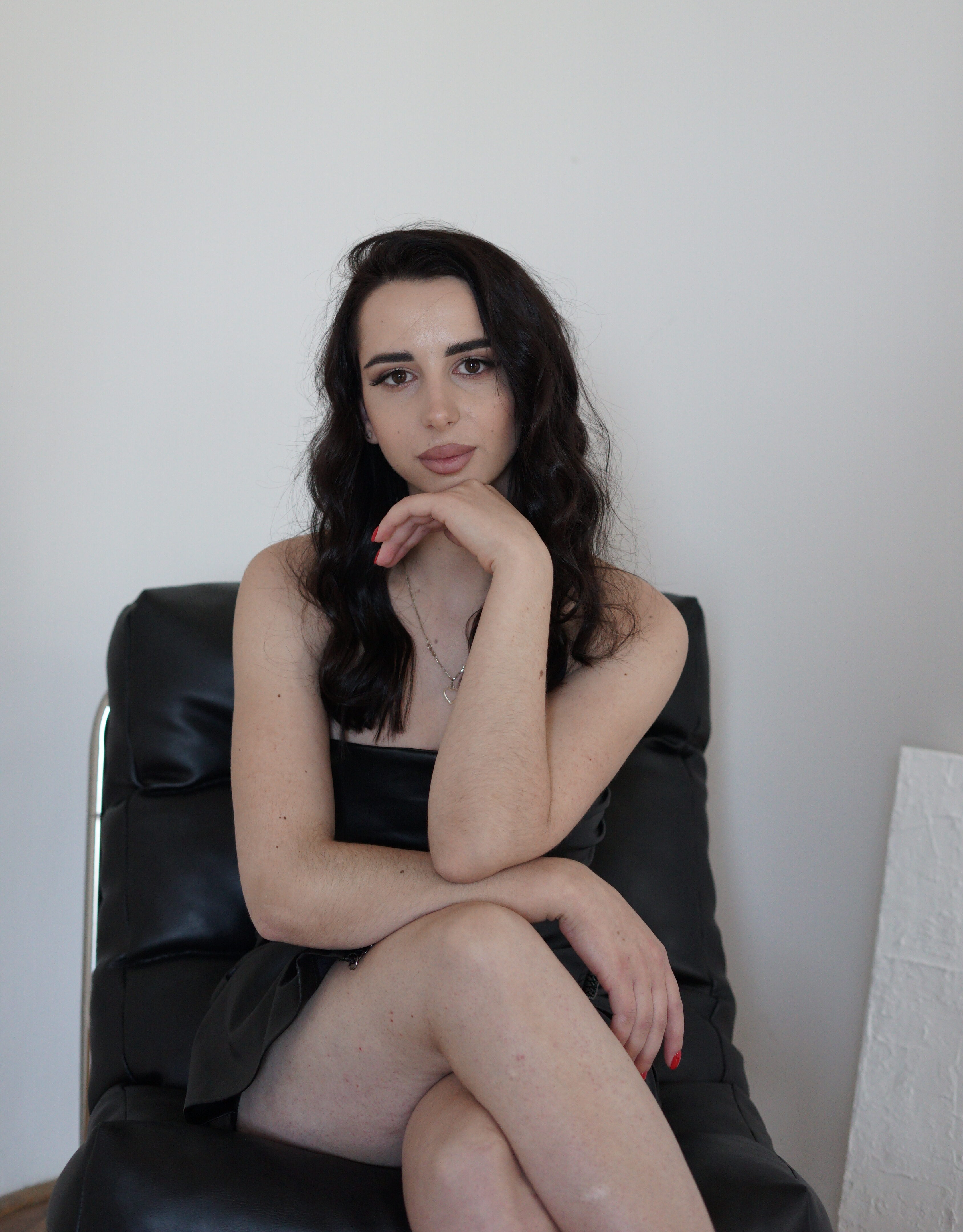 RADBOR Growth Agency team member sitting in an office chair, About Us page portrait