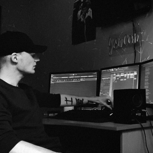 RADBOR team member working at a multi-monitor desk setup